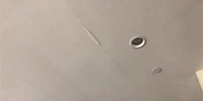 Drywall Cracking, Nail Pops, and Hole Repair
