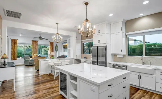 This New River Kitchen layout was redesigned to create a seamless connection between the living and dining areas. The open layout enhances everyday living and effortless entertaining.