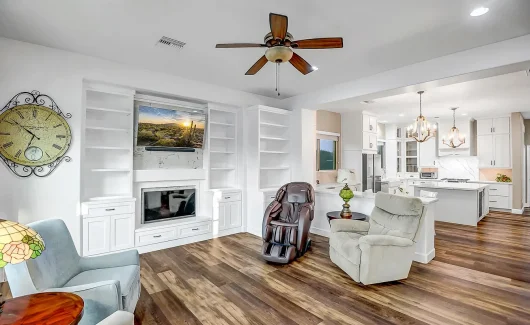 This fully custom entertainment space features custom-sized niches that provide the perfect place to display décor and meaningful items.
