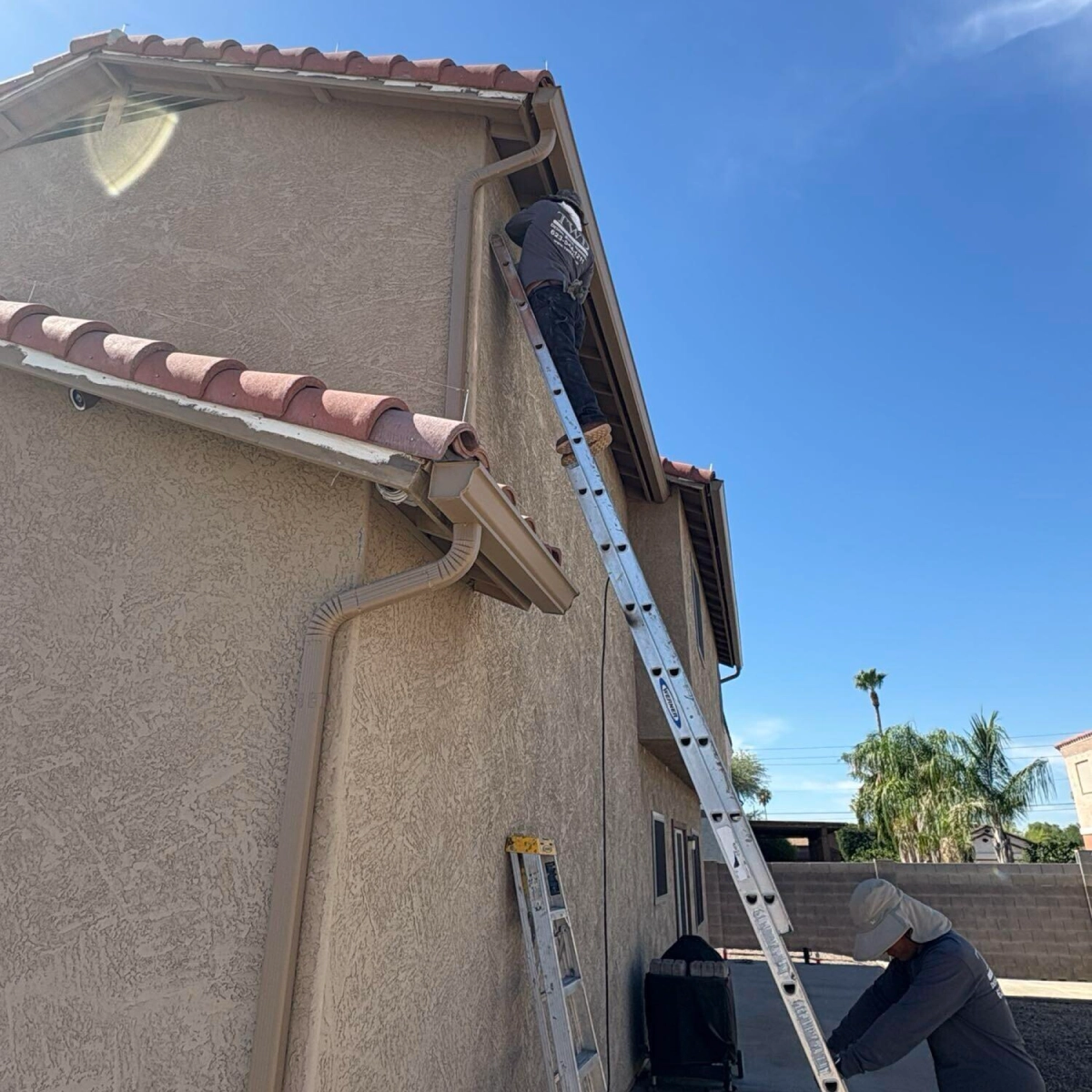 TWD technician repairing a water-damaged ceiling to a clean finish TWD technician repairing a water-damaged ceiling to a clean finish